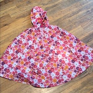 Pink and purple poncho w/ flower design